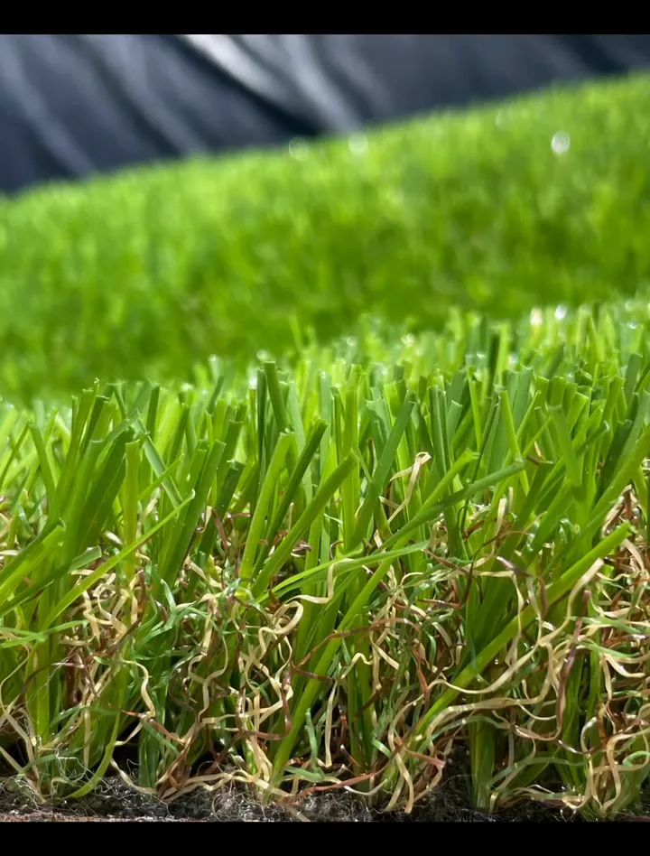 Pormenor das fibras de relva sintética Turfgrass
